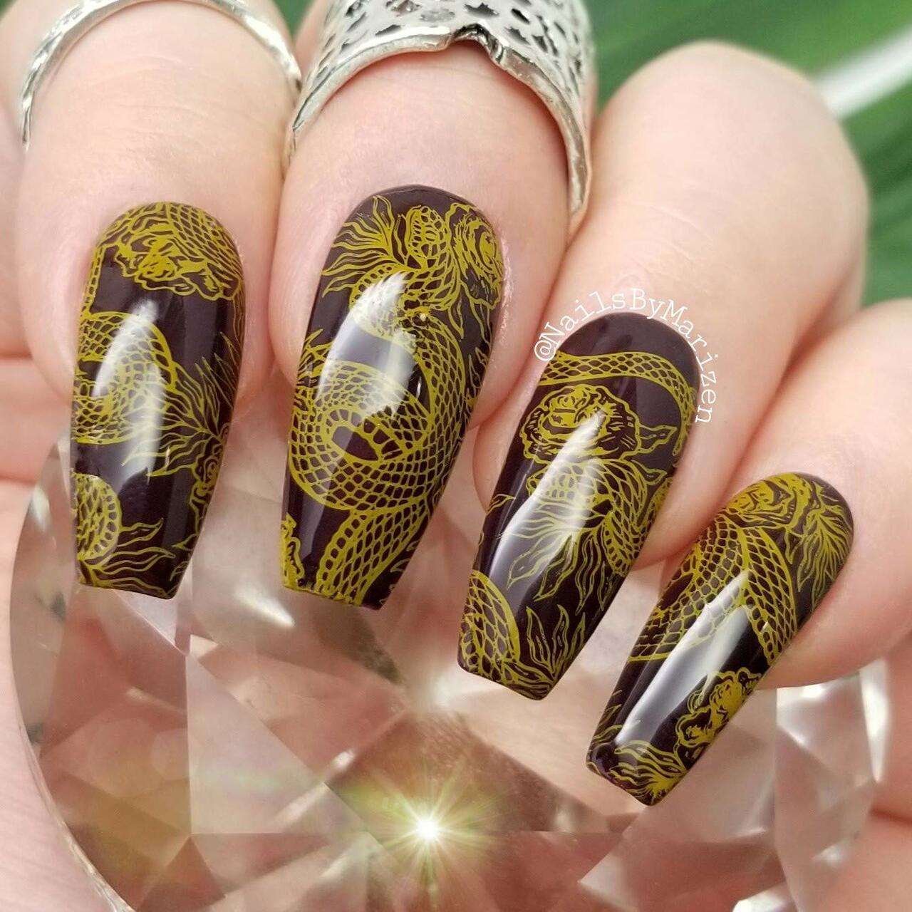 burgundy and gold nails