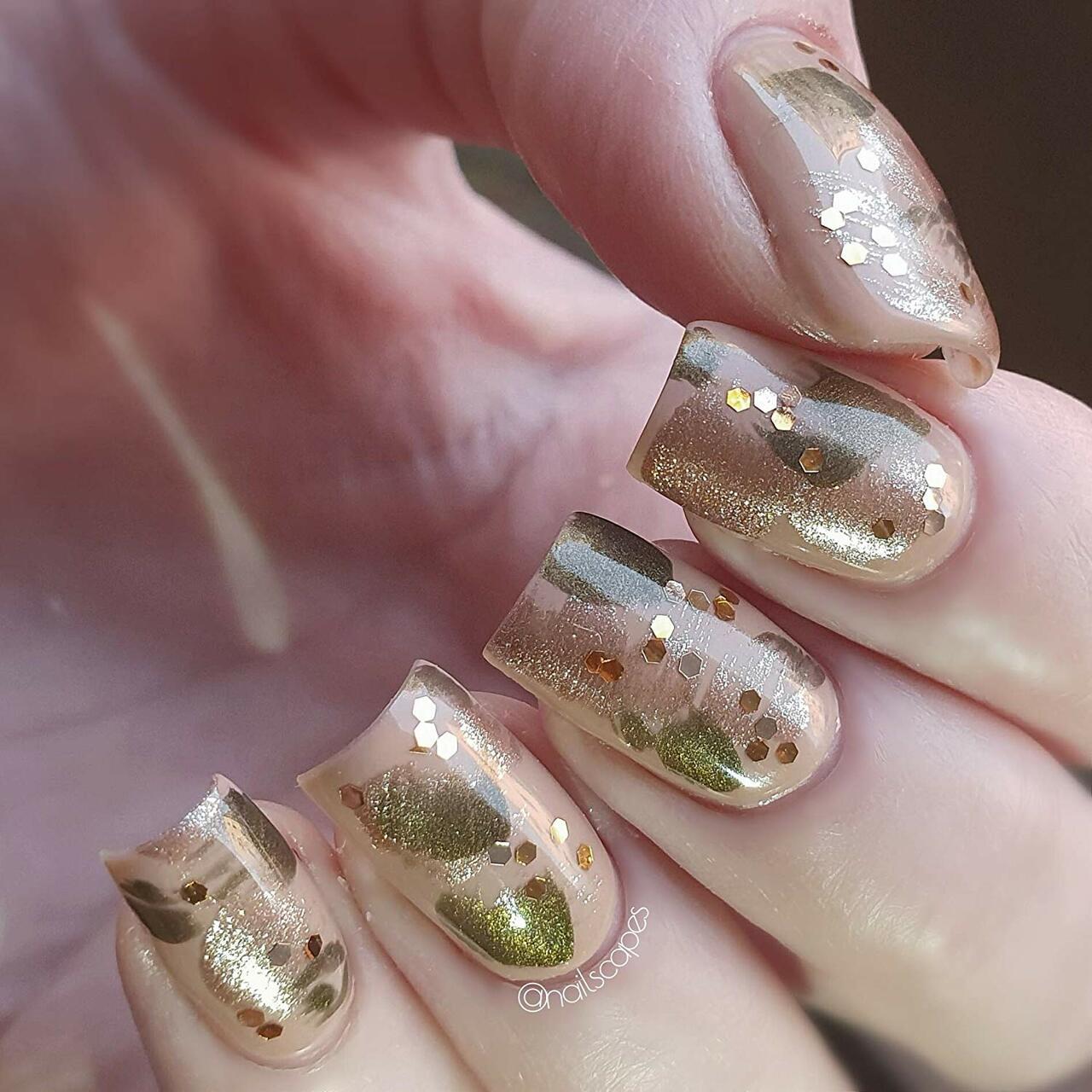 nude and gold nails