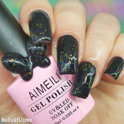 black nails with gold glitter