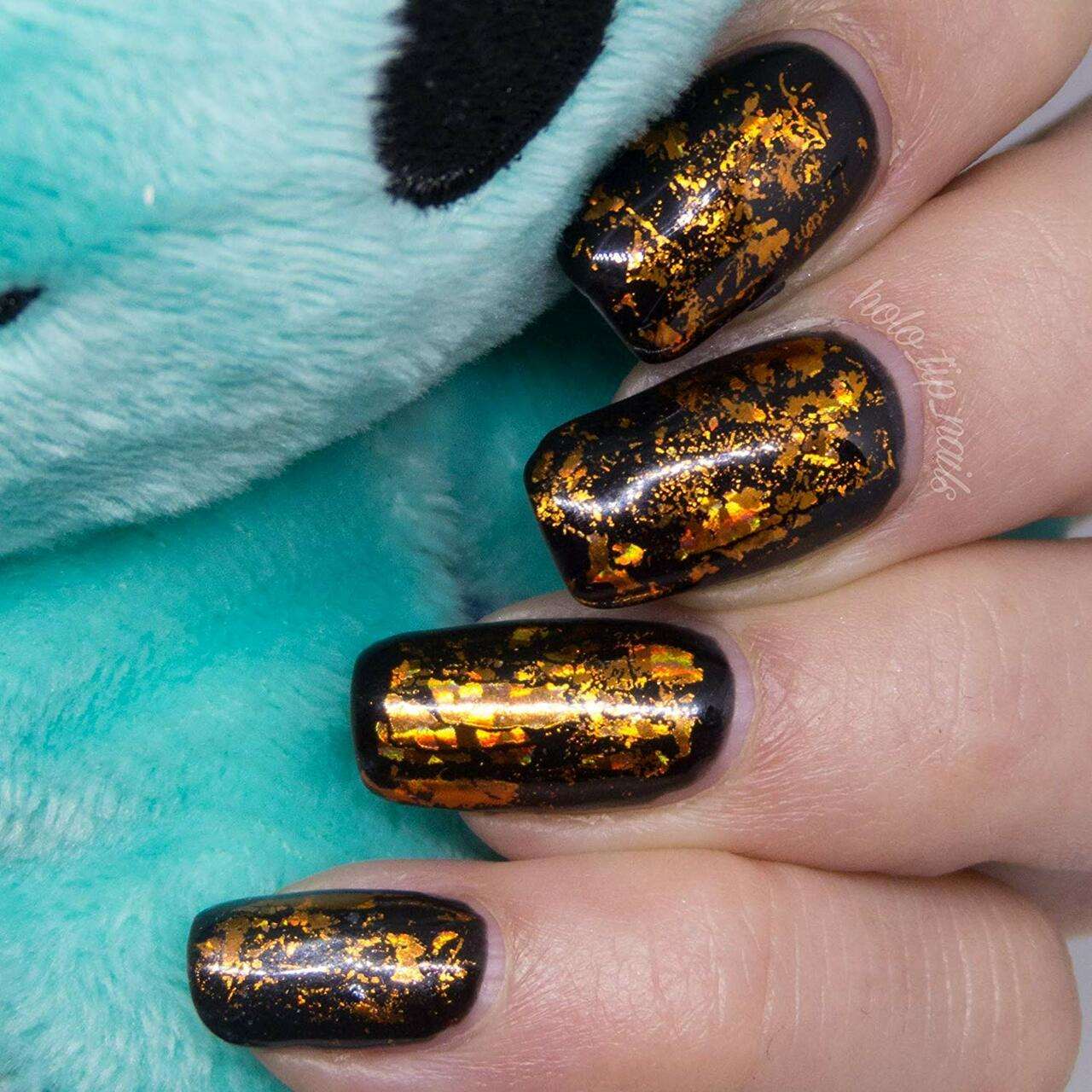 black sparkle nail polish 
