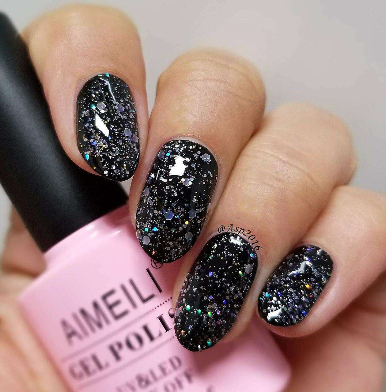 purple nails with sparkles