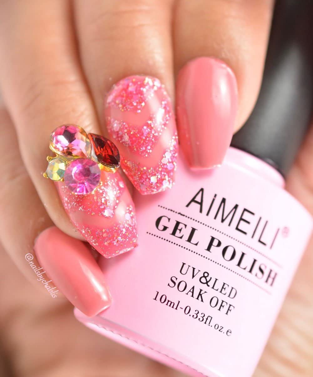 barbie pink nails with glitter