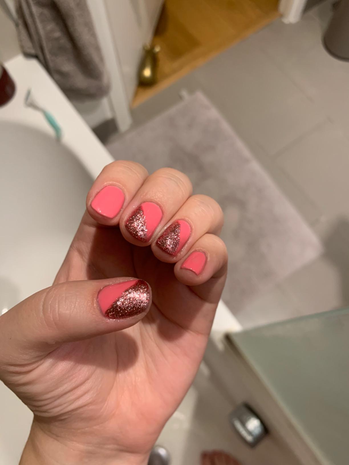 pink nail polish with glitter