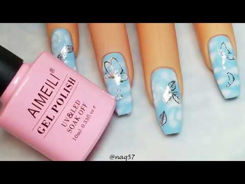 light blue nails with design